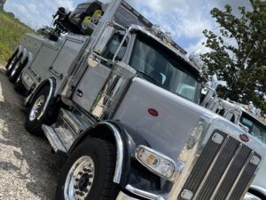 2025 Peterbilt 589 with a 2026 NRC 85 Ton Rotator